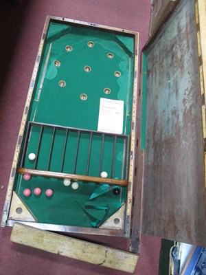 Lot 1144 - A vintage oak folding Bagatelle board With...