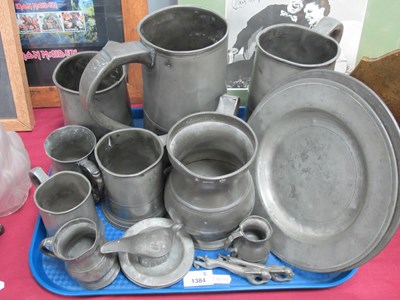 Lot 1384 - Pewter Tankards and Measures, the tallest...