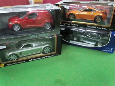 Lot 637 - Four 1:18 Scale Diecast Model Cars by Maisto,...