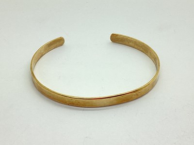 Lot 69 - A 9ct Gold Bangle, of plain design (12.9grams).