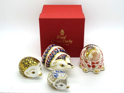 Lot 1035 - Four Royal Crown Derby Porcelain Paperweights,...