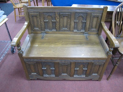 Lot 1593 - A XX Century Oak Monks Bench, with panelled...