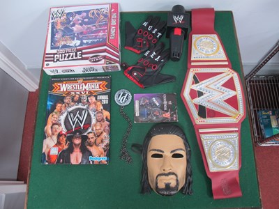 Lot 483 - A Collection of WWE Wrestling Themed Items by...