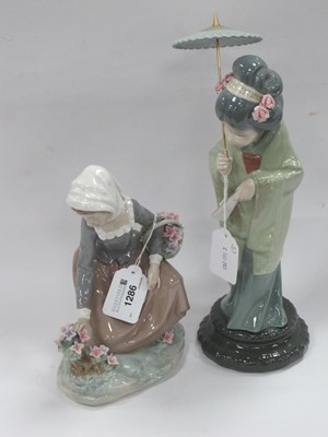 Lot 1286 - Two Lladro Figurines - A Japanese Lady holding...