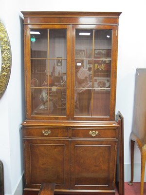 Lot 1605 - A Walnut Bookcase by "Ian Smith Reproductions...