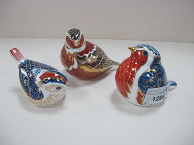 Lot 1295 - Royal Crown Derby Paperweights - Three various...