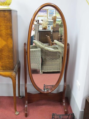 Lot 1608 - Cheval Mirror, with an oval mirror, shaped...