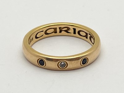 Lot 60 - Clogau; An 18ct Gold 'Cariad' Three Stone Band,...