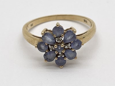 Lot 62 - A 9ct Gold Stone Set Ring, of floral cluster...