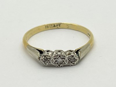 Lot 50 - A Diamond Three Stone Ring, the brilliant cut...