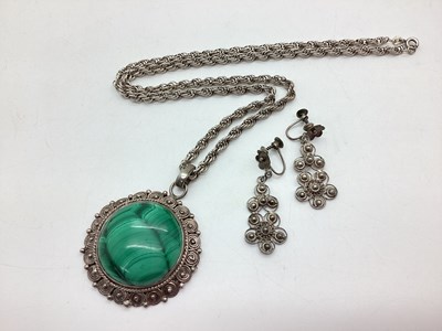 Lot 200 - A Malachite Inset Pendant, the collet set...