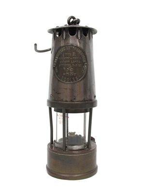 Lot 1296 - A Miners Lamp, by 'The Protector Lamp and...