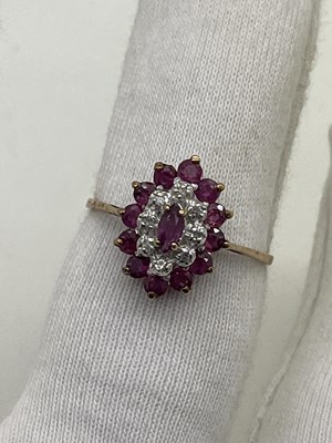 Lot 21 - A 9ct Gold Stone Set Cluster Ring, the...