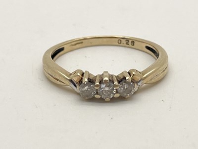 Lot 22 - A 9ct Gold Three Stone Diamond Ring, the...