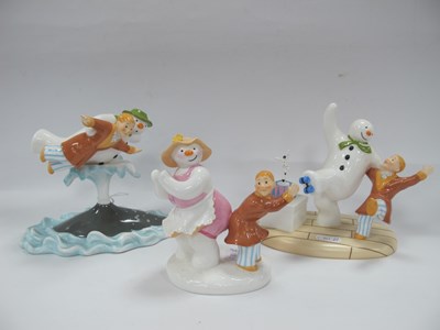 Lot 1328 - Coalport The Snowman Figures - Walking in The...