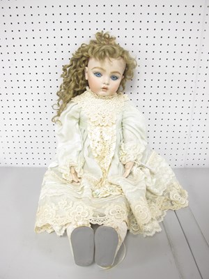 Lot 291 - A Bisque Headed Doll, with blue set eyes,...