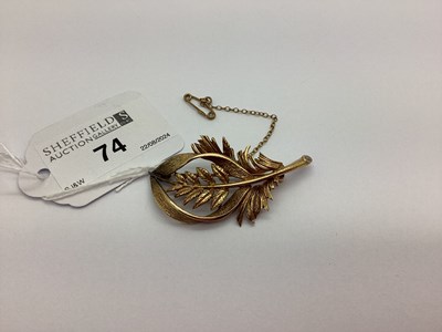 Lot 74 - A 9ct Gold Leaf Spray Brooch, of textured design.