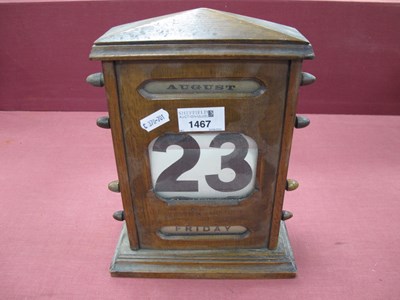 Lot 1467 - Table Top Oak Desk Calendar, with side knobs...