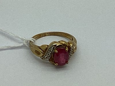 Lot 48 - A 9ct Gold Stone Set Ring, the oval shape...