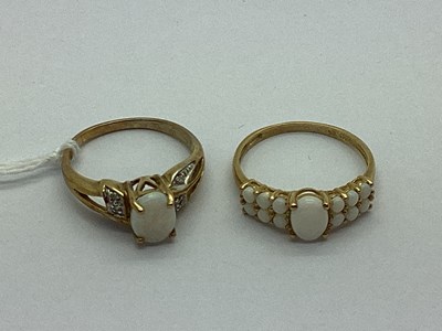 Lot 40 - A 9ct Gold Opal Set Dress Ring, the oval...