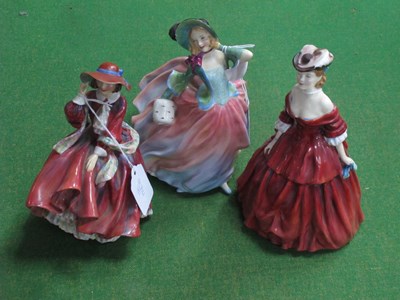 Lot 1296 - Royal Doulton Figurines, 'Autumn Breezes',...