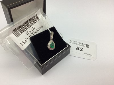 Lot 83 - A Modern 18ct White Gold Emerald and Diamond...