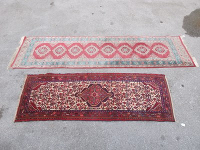 Lot 1518 - Middle Eastern Wool Runner, with central...