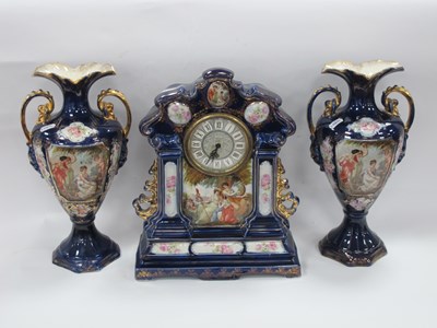 Lot 1227 - Continental Pottery Clock Garniture Set with...