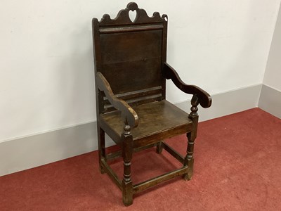 Lot 1490 - A XVII Century Joined Oak Armchair, the shaped...