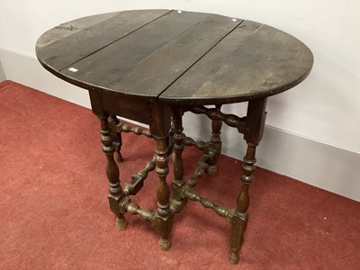 Lot 1481 - A XVII Century Joined Oak Drop Leaf Table,...