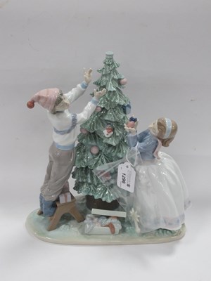 Lot 1296 - Lladro 'Trimming The Tree' 5897 Figure Group,...