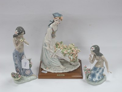 Lot 1300 - Lladro Hawaiian Gir figures (2), the tallest...