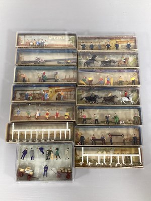 Lot 764 - Fourteen HO scale People to include track...