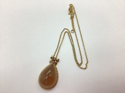 Lot 74 - A 9ct Gold Single Stone Pendant, high domed...