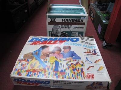 Lot 1119 - A boxed Hanimex slide projector together with...