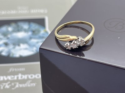 Lot 60 - A 9ct Gold Three Stone Diamond Ring, the...