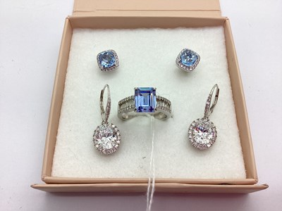 Lot 81 - A "925" Dress Ring, rectangular claw set to...