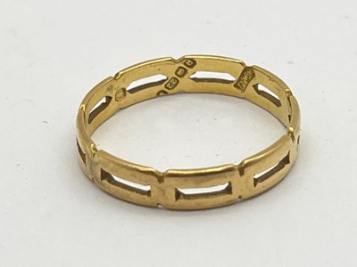 Lot 22 - A 22ct Gold Shaped and Pierced Band, London...