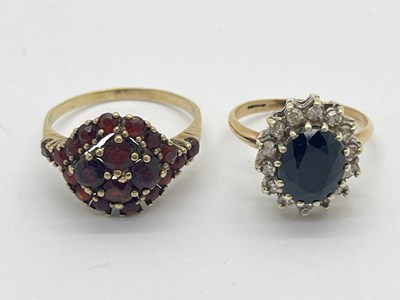 Lot 48 - A 9ct Gold Oval Cluster Dress Ring, claw set...