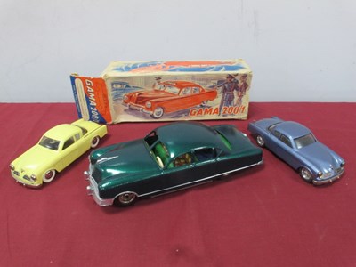 Lot 734 - Two Dux Clockwork Cars, both American Outline,...