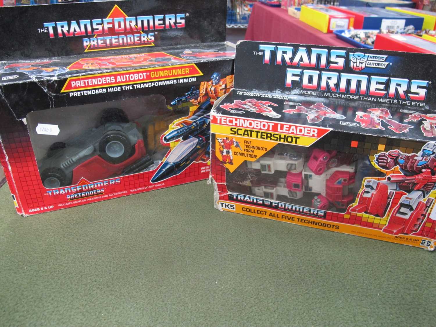 Lot 608 - Two boxed circa 1980's Transformers by Hasbro...