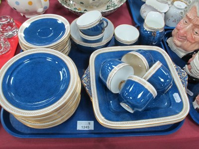 Lot 1245 - A Wedgwood part tea service in blue with gilt...