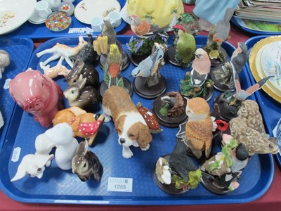 Lot 1255 - A large collection of animal figurines to...