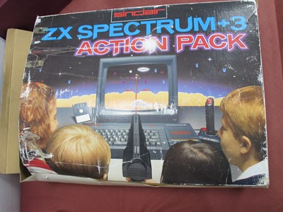 Lot 399 - A Sinclair ZX Spectrum +3 Action Pack. Box...