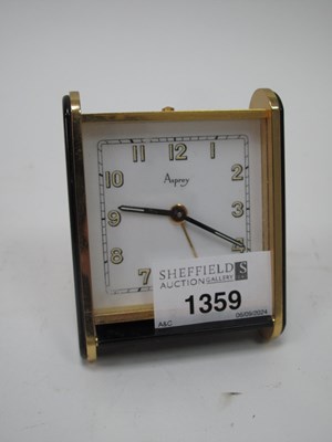 Lot 1359 - Asprey Travel Alarm Clock in black glass and...