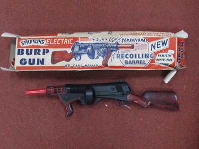 Lot 554 - A Sparkling Electric Burp Gun by Marx,...