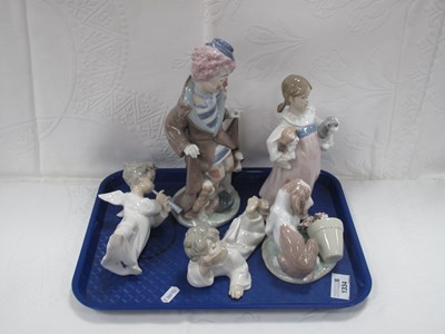 Lot 1334 - Lladro - Clown 5901 24cm high, Lady Holding...