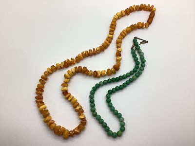 Lot 88 - A Graduated Amber Colour Single Strand Bead...