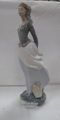 Lot 1286 - Lladro Figure of a Lady, wearing headscarf and...