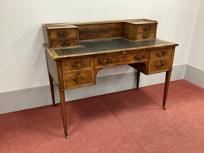 Lot 1471 - An Edwardian Writing Desk, with three-quarter...